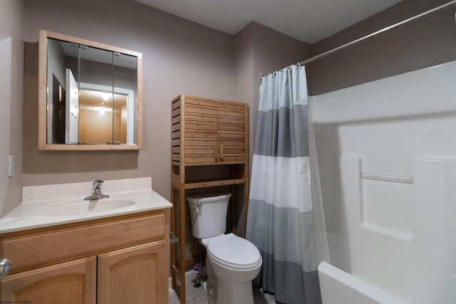 full bathroom with toilet, shower / bath combo with shower curtain, and vanity