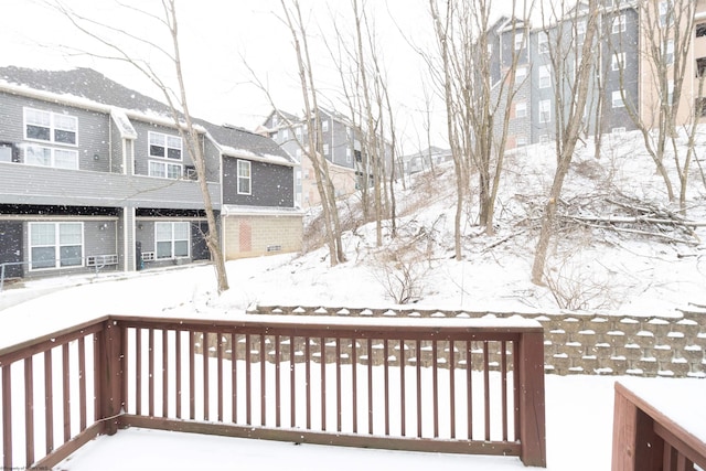 view of snow covered deck