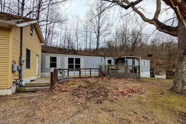 exterior space featuring a wooden deck