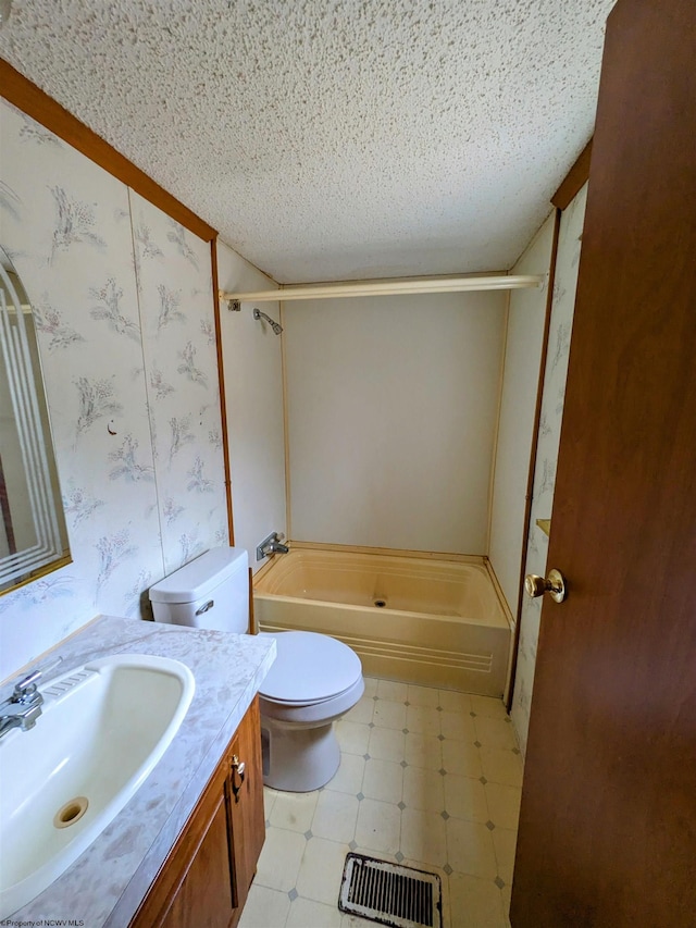 bathroom featuring shower / bath combination, vanity, visible vents, tile patterned floors, and wallpapered walls