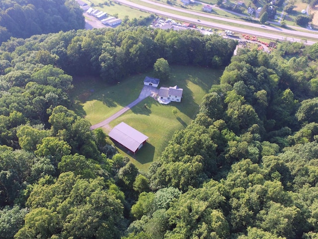 aerial view featuring a view of trees