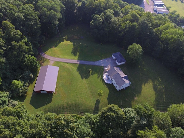 bird's eye view with a rural view and a view of trees