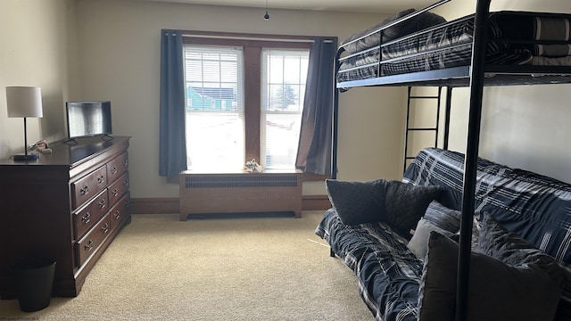 bedroom with light colored carpet