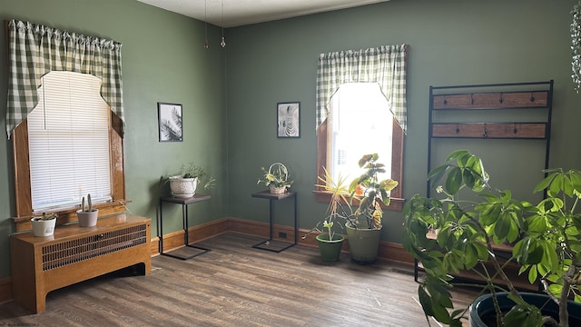 sitting room featuring wood finished floors and baseboards