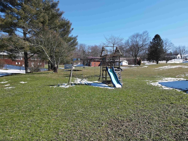 view of yard featuring playground community