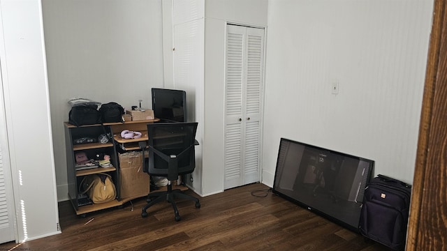 office space with dark wood finished floors