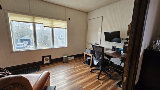 office featuring light wood-style flooring and visible vents