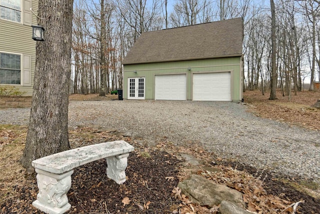 detached garage featuring french doors