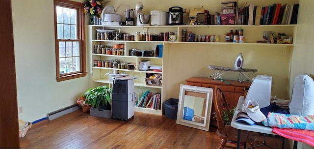 interior space featuring baseboard heating