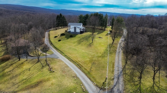 aerial view with a rural view and a forest view