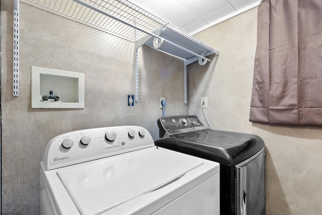 clothes washing area with laundry area and independent washer and dryer