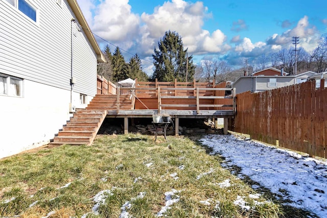 view of yard featuring stairs, fence, and a deck