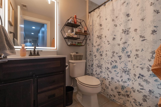 full bath with curtained shower, visible vents, toilet, vanity, and tile patterned flooring