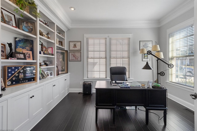 office space with dark wood-style floors, crown molding, and baseboards