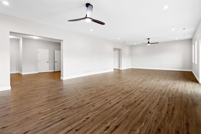 unfurnished living room with a ceiling fan, recessed lighting, visible vents, and wood finished floors