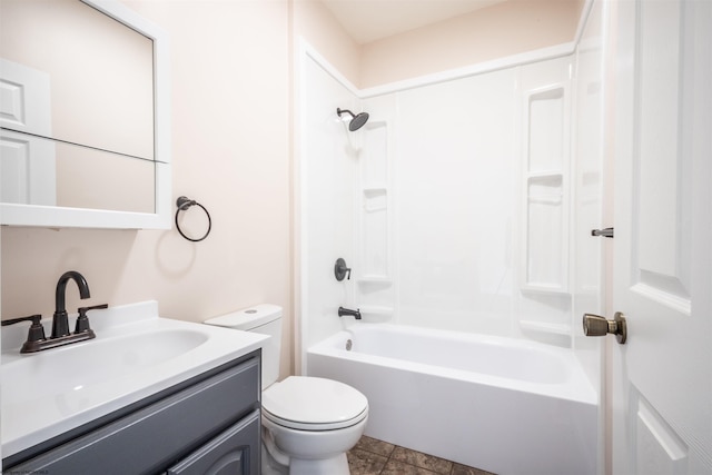 bathroom with shower / washtub combination, vanity, and toilet