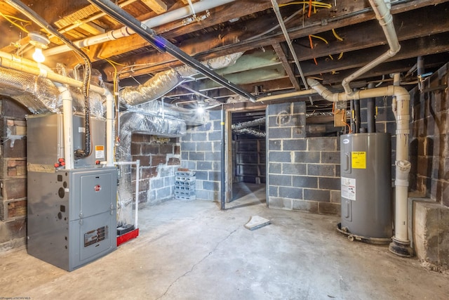 unfinished basement with electric water heater and heating unit