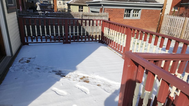 view of snow covered deck