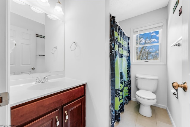 bathroom with baseboards, toilet, a shower with curtain, tile patterned flooring, and vanity