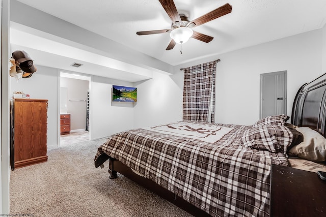 bedroom with a ceiling fan, light colored carpet, and visible vents