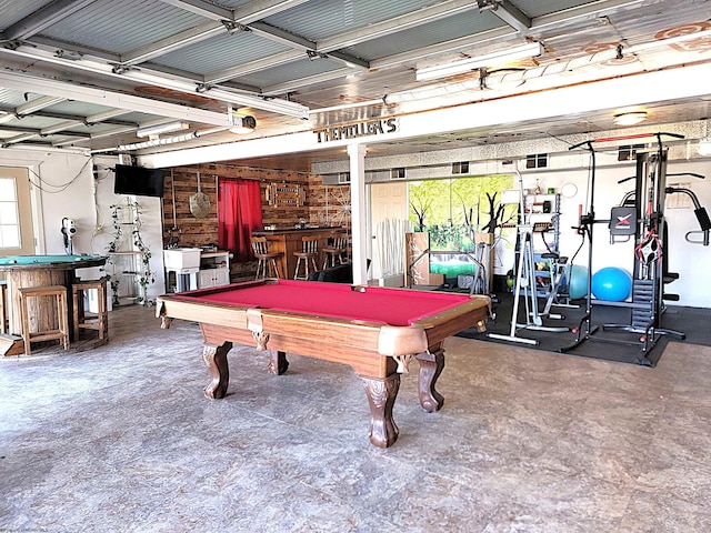 recreation room with billiards and a bar