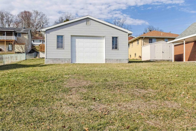 detached garage with a shed