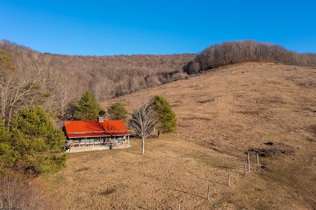 mountain view featuring a rural view