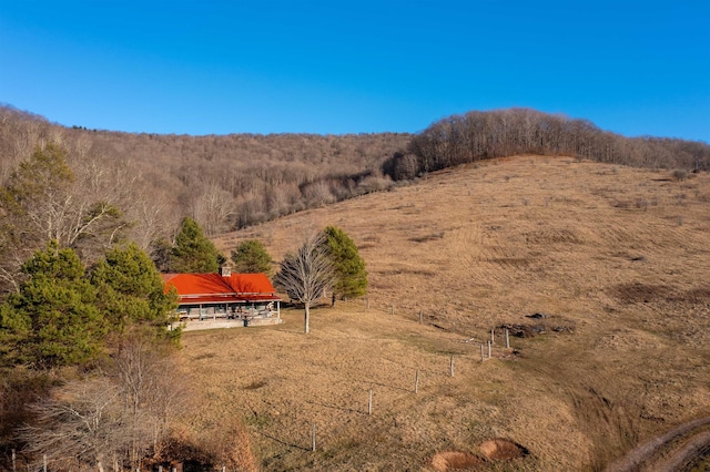 property view of mountains featuring a rural view