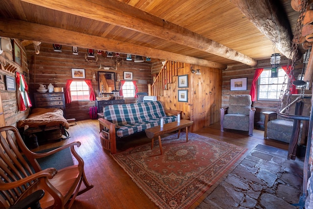 living area featuring wooden ceiling, stairs, hardwood / wood-style floors, and beamed ceiling