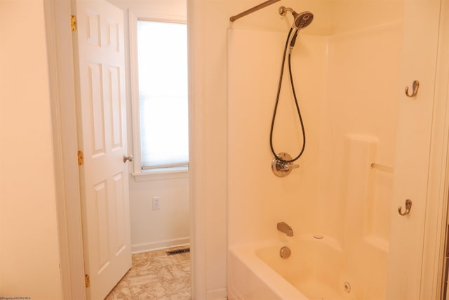 bathroom with visible vents and tub / shower combination