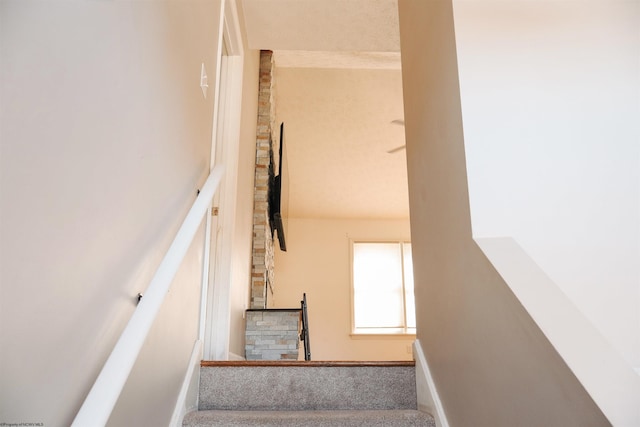 stairs featuring baseboards