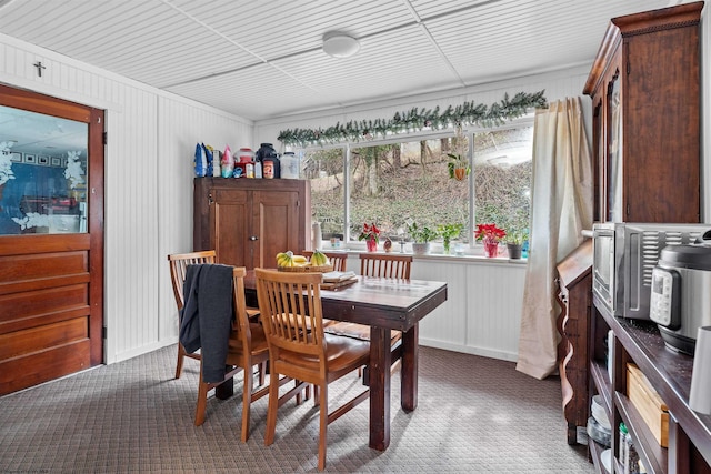 view of carpeted dining space