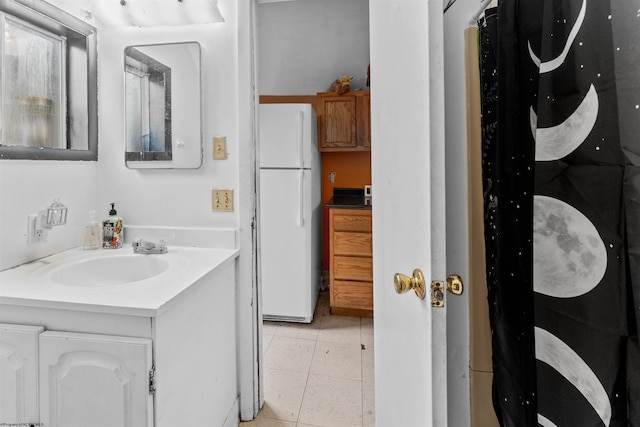 bathroom featuring vanity and tile patterned floors