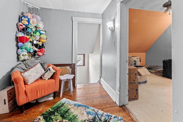 sitting room featuring wood-type flooring