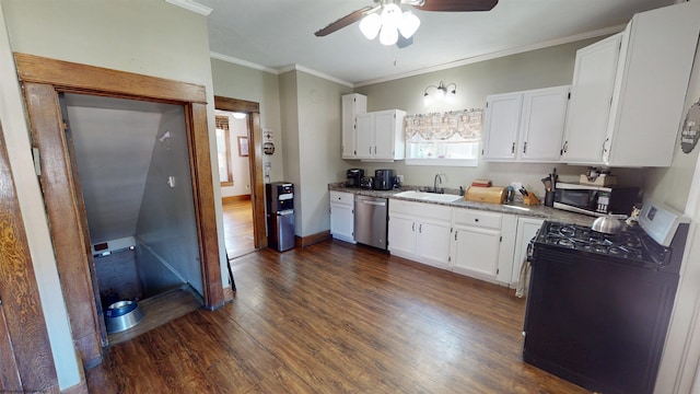 kitchen with dark wood-style flooring, crown molding, appliances with stainless steel finishes, white cabinetry, and a sink