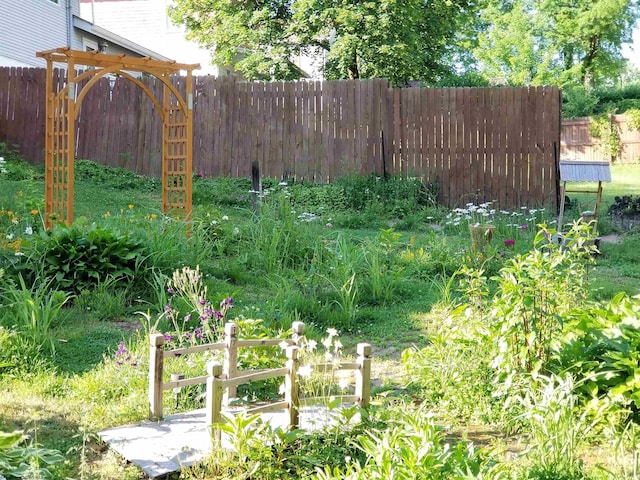 view of yard with fence