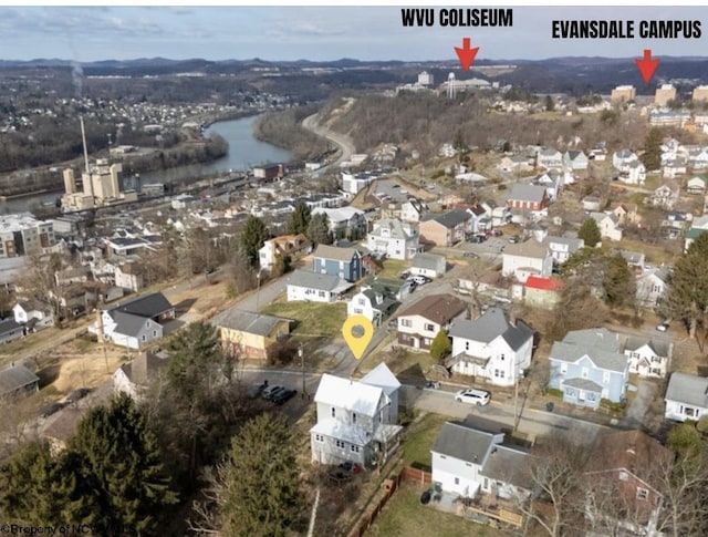 aerial view with a residential view and a water view