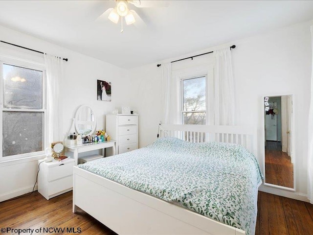 bedroom featuring ceiling fan and wood finished floors