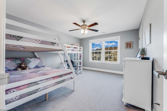 bedroom featuring carpet, ceiling fan, and baseboards