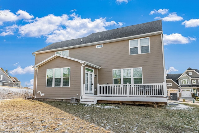 back of property with french doors, central AC, and a wooden deck