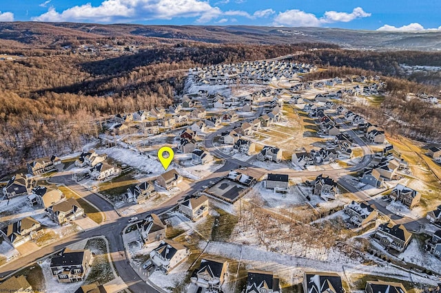 drone / aerial view with a residential view and a mountain view