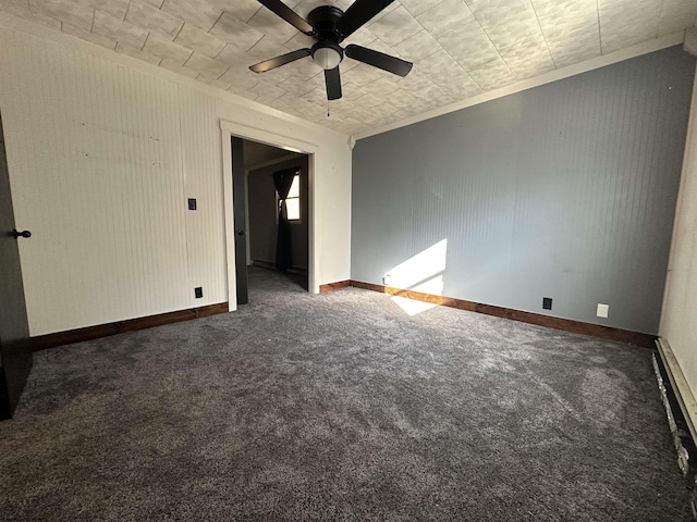 spare room featuring carpet floors, baseboards, and a ceiling fan