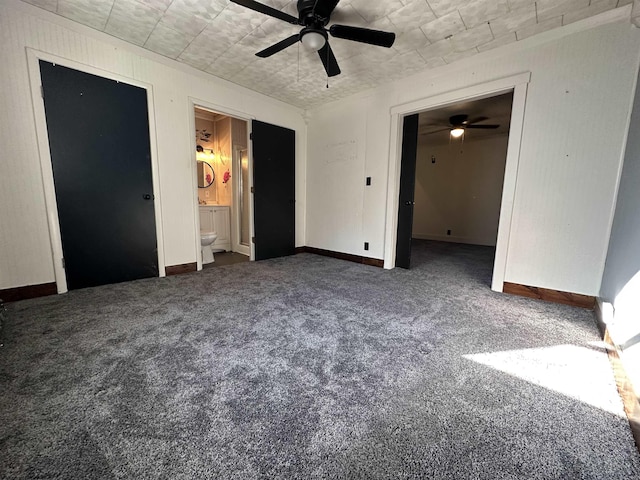 unfurnished bedroom with carpet flooring, ceiling fan, and baseboards