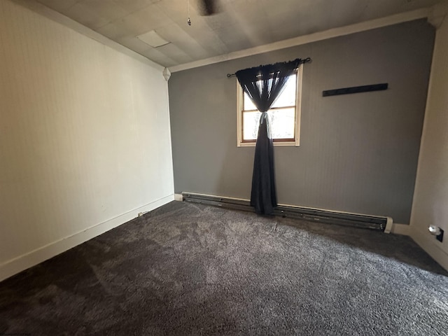 spare room with dark carpet
