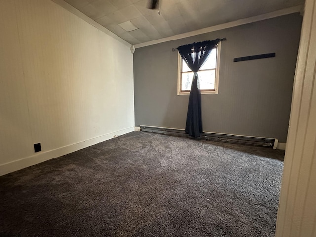 unfurnished room featuring baseboards, dark carpet, and vaulted ceiling
