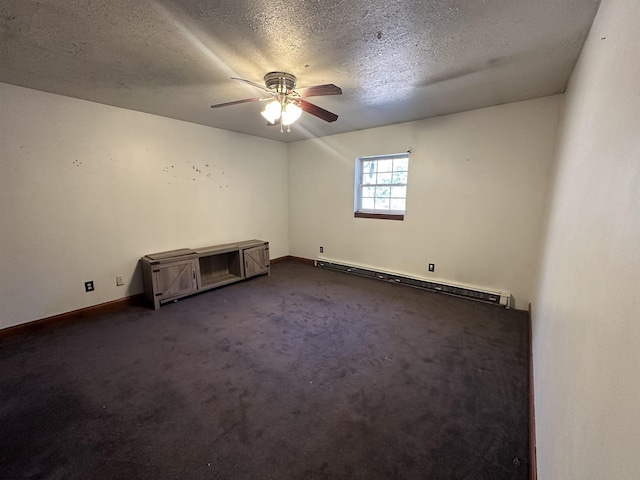 empty room featuring dark carpet, a baseboard heating unit, ceiling fan, a textured ceiling, and baseboards