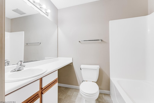 bathroom with toilet, baseboards, visible vents, and vanity