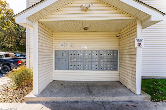 view of home's community featuring mail area