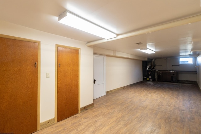 3508 Old Mill Rd, Weston, WV 26452 - below grade area with wood finished floors and baseboards
