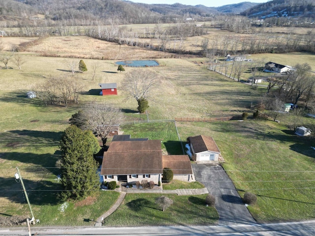 bird's eye view featuring a rural view and a mountain view